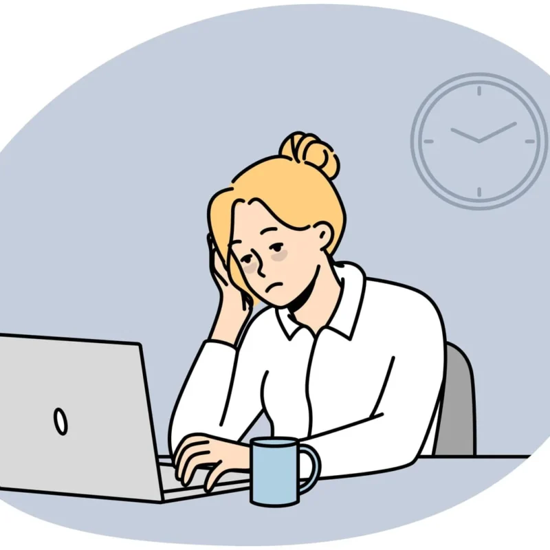 Tired Female Employee Burnout At Office Desk