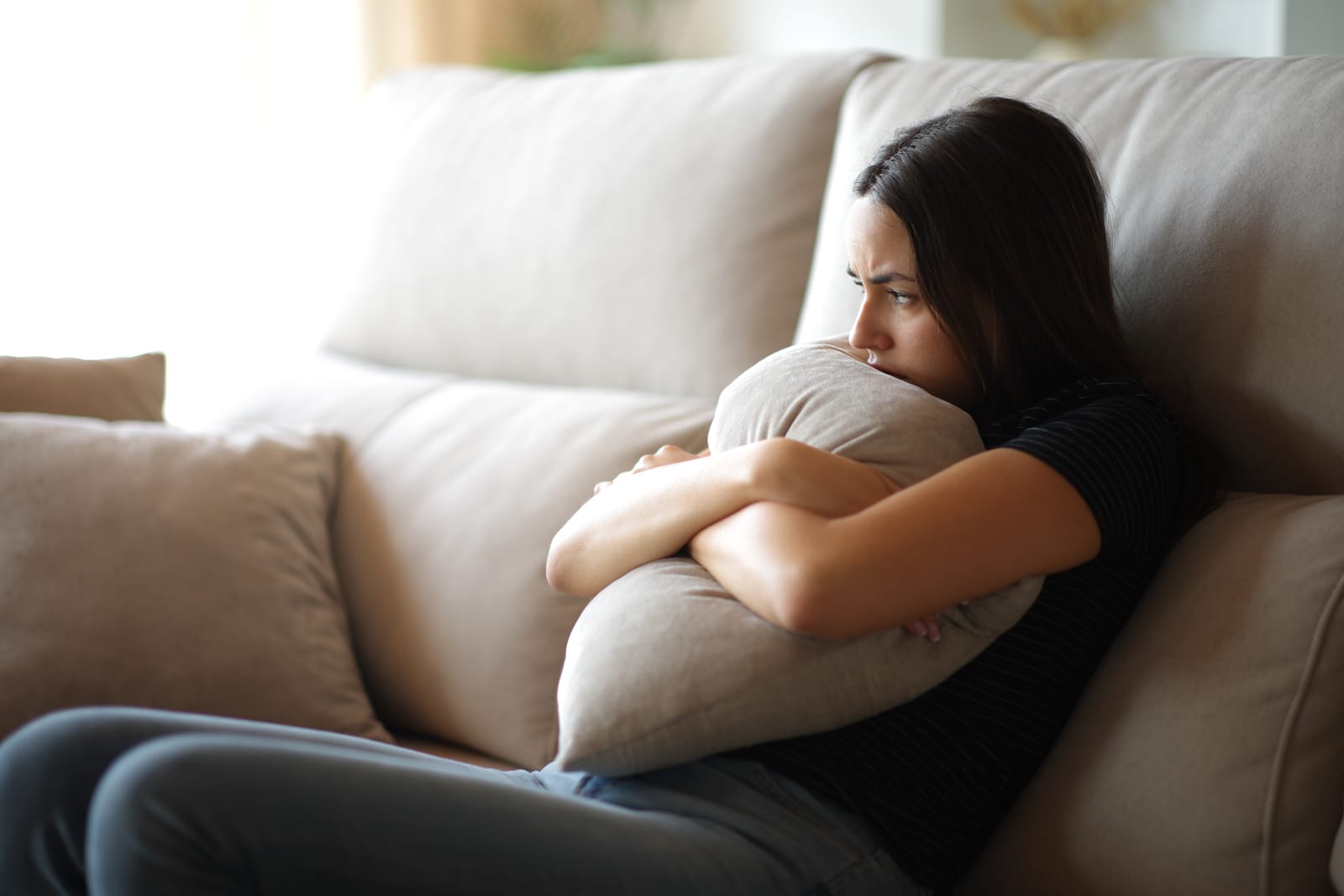 woman with bereavement sitting and looking ahead